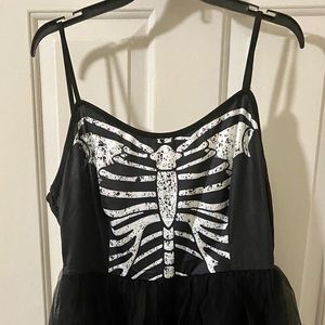 Skeleton mini dress with layered tulle.
